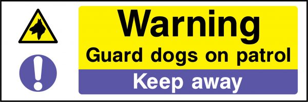 Warning guard dogs on patrol keep away sign