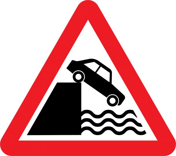 Quayside or river bank road sign