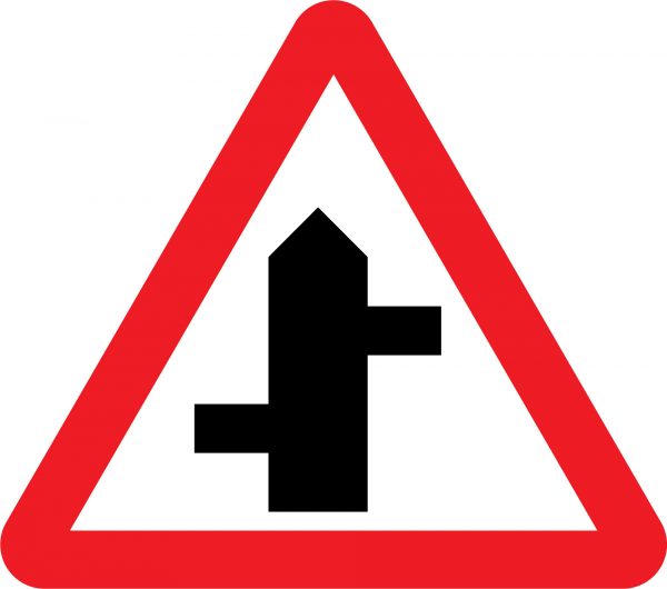 Staggered junction road sign
