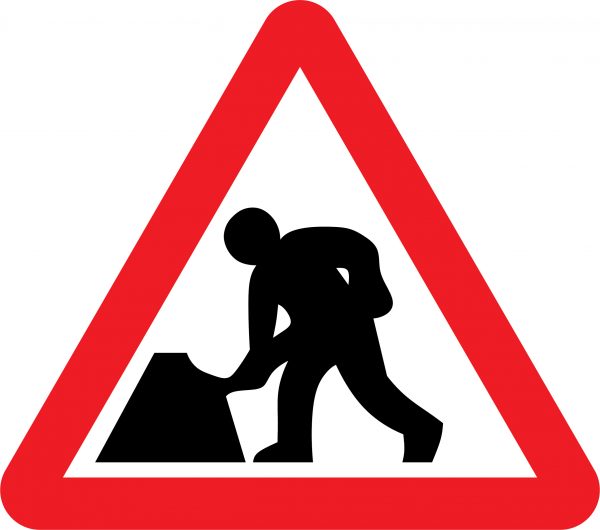 Men at work road sign